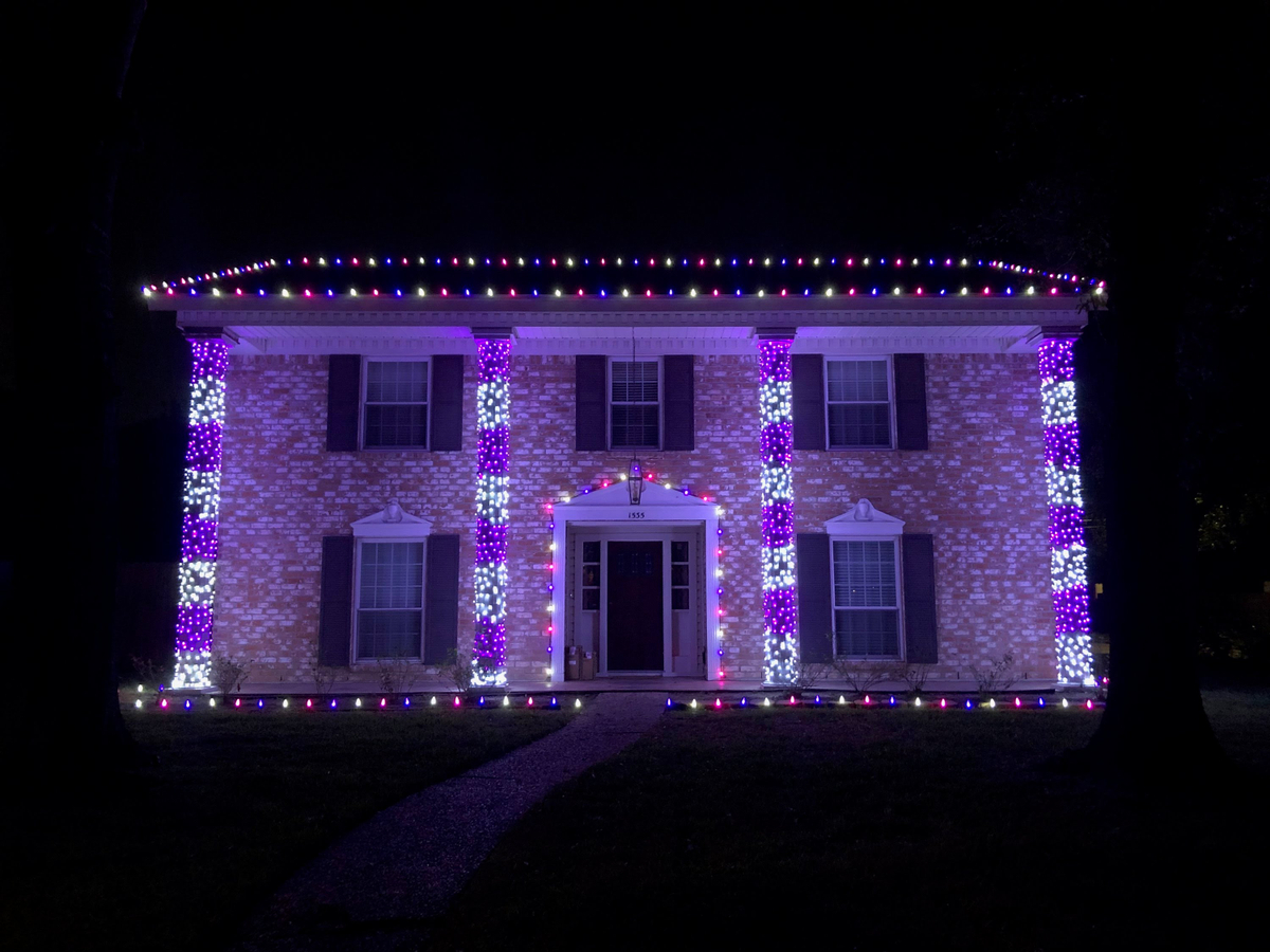 House decorated in festive LED lights 